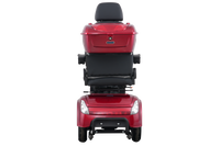 Avantis Traveller scooter showing full suspension stability on an uneven outdoor surface.